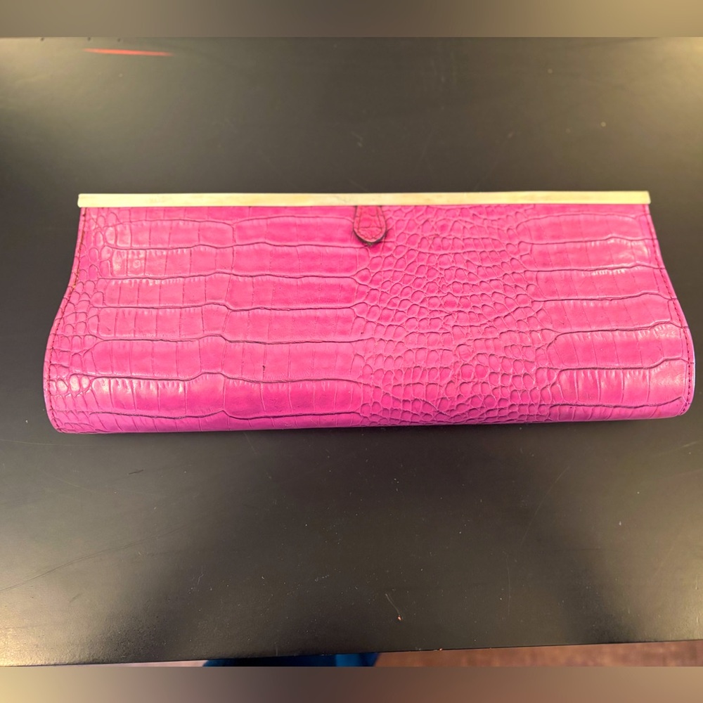 Aldo Magenta Clutch w/ lime green lining.
Perfect Condition!